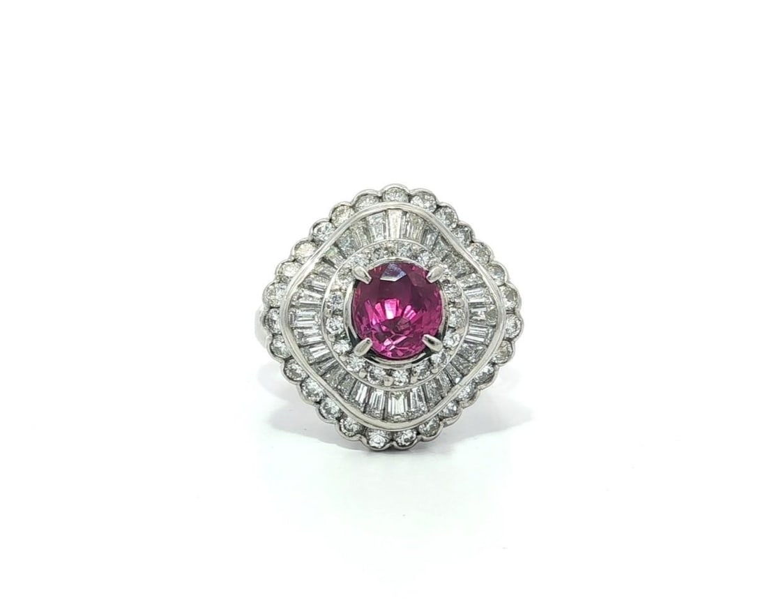 Platinum GIA Certified 2.77ctw Vivid Pink Sapphire Diamond Ballerina Ring: Platinum GIA Certified 2.77ctw Vivid Pink Sapphire Diamond Ballerina Ring This exquisite cocktail ring features a stunning natural Ceylon pink sapphire, weighing 1.35ct, expertly set in solid platinum