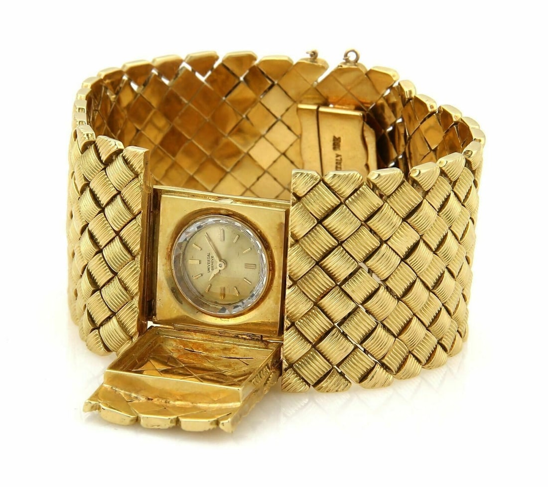 18k Yellow Gold Hidden Cove Wrap Watch Bracelet 106g: 18k Yellow Gold Hidden Cove Wrap Watch Bracelet 106g This wrap-style bracelet features a hidden watch design and is crafted from 18k yellow gold. Weighing 106.5 grams, the bracelet offers both luxury