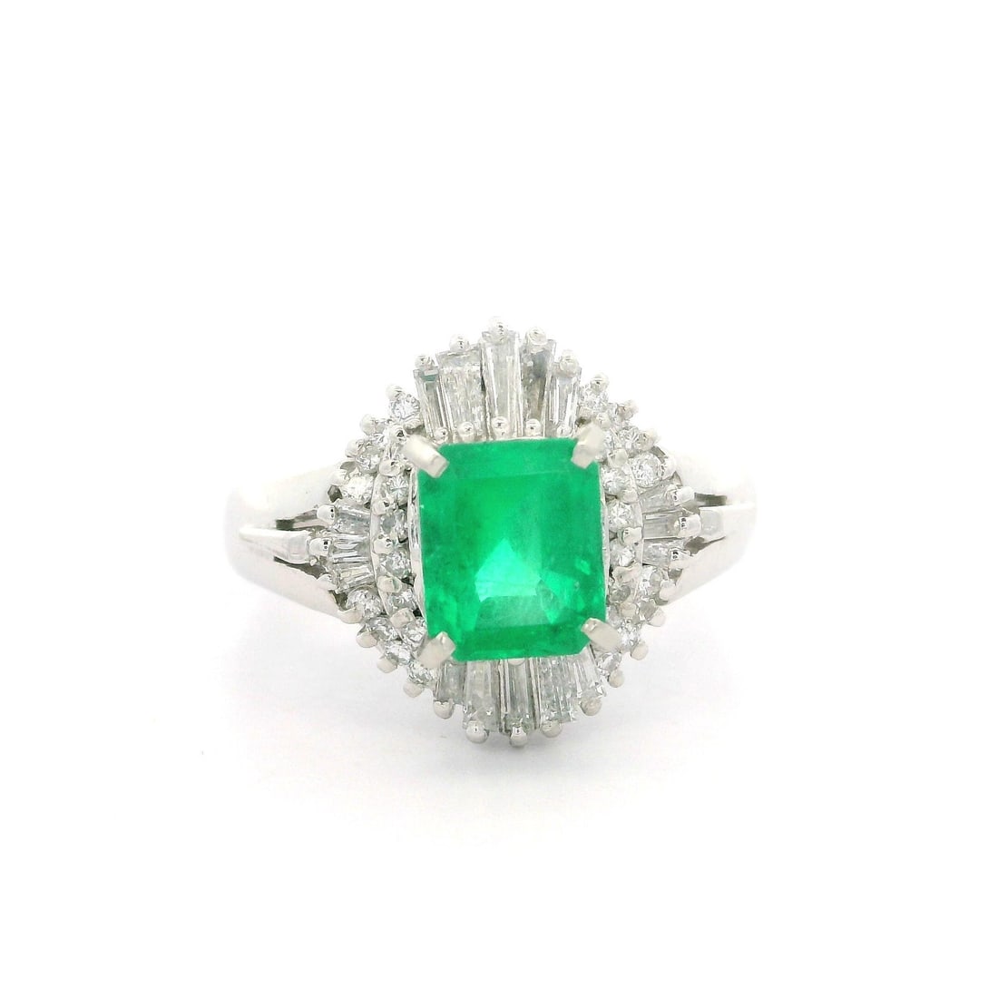 Platinum GIA Certified 1.53ct Colombian Emerald Diamond Ballerina Ring: Platinum GIA Certified 1.53ct Colombian Emerald Diamond Ballerina Ring This exquisite cocktail ring is crafted in solid platinum and features a stunning natural Colombian emerald, prong set in an octa