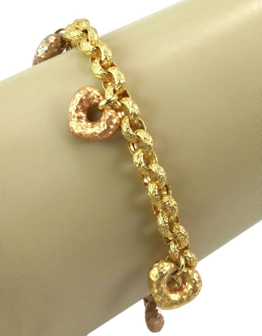 Vintage 19k Multicolor Gold Bracelet with Five Hammered Heart Charms: Vintage 19k Multicolor Gold Bracelet with Five Hammered Heart Charms This vintage charm bracelet features five hand-hammered heart charms crafted from 19k multicolor gold, including yellow, rose, and