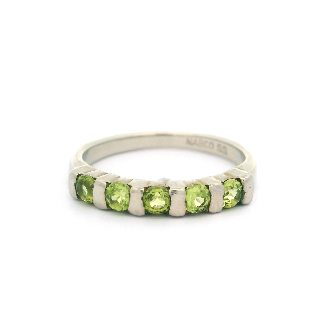 Chanel Sterling Silver Green Gemstone Band Ring Size 7: Chanel Sterling Silver Green Gemstone Band Ring Size 7 This stunning Nabco Sterling Silver Channel Bar Set showcases an exquisite green gemstone band ring in size 7. The ring features five natural rou