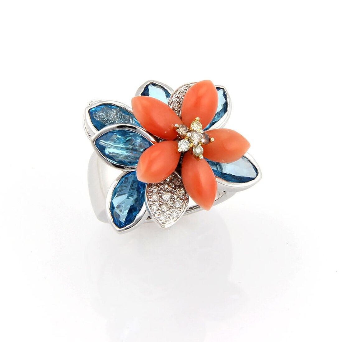 Floral Design 18k White Gold Ring with Diamond Coral and Topaz Stones Size 6: Floral Design 18k White Gold Ring with Diamond Coral and Topaz Stones Size 6 This exquisite ring features a movable floral design set with 0.56 carats of diamonds and 5.83 carats of coral and blue top