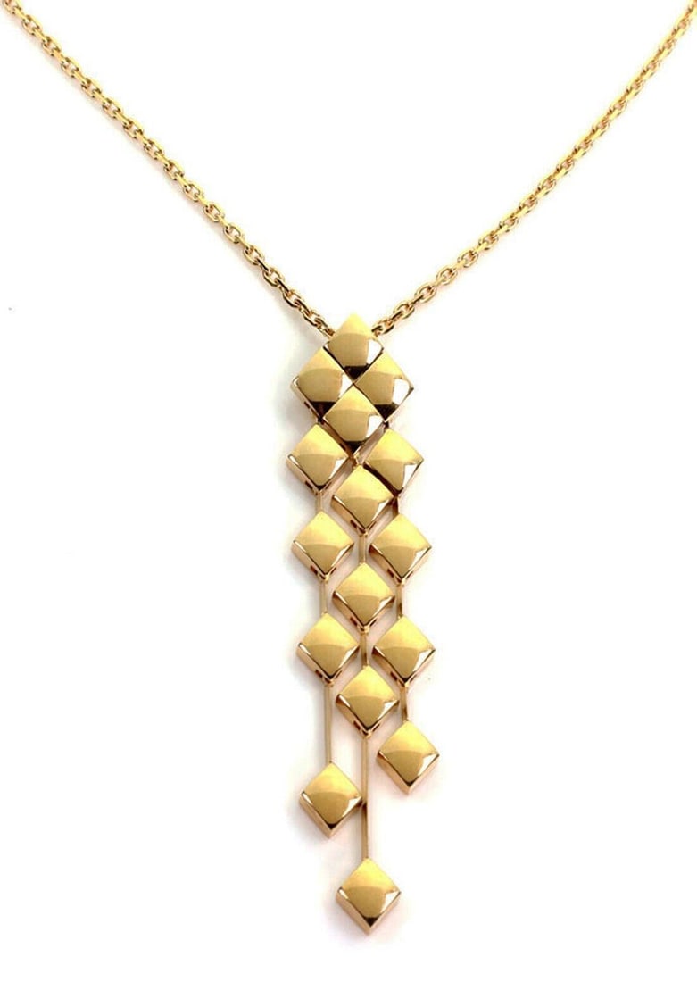 Chanel 18k Yellow Gold Matelasse Lariat Pendant Necklace: Chanel 18k Yellow Gold Matelasse Lariat Pendant Necklace This Chanel Matelasse dangle pendant necklace is crafted in 18k yellow gold and features a lariat style design. The necklace is signed and hall