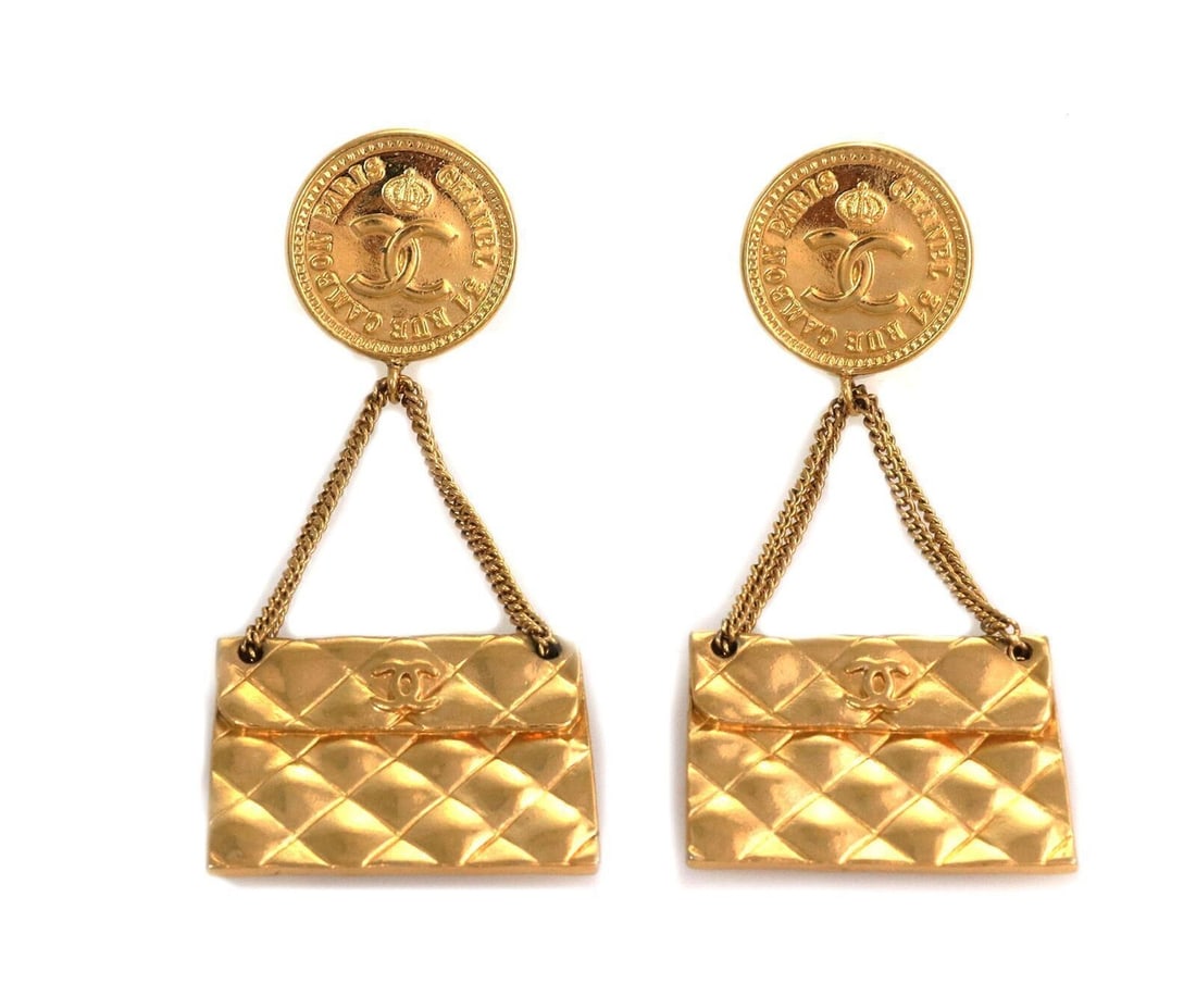 Chanel 2.55 Quilted Bag Motif Clip On Dangle Earrings with C Logo: Chanel 2.55 Quilted Bag Motif Clip On Dangle Earrings with C Logo These Chanel dangle clip-on earrings feature a design inspired by the iconic 2.55 quilted bag motif and the signature C logo. Crafted
