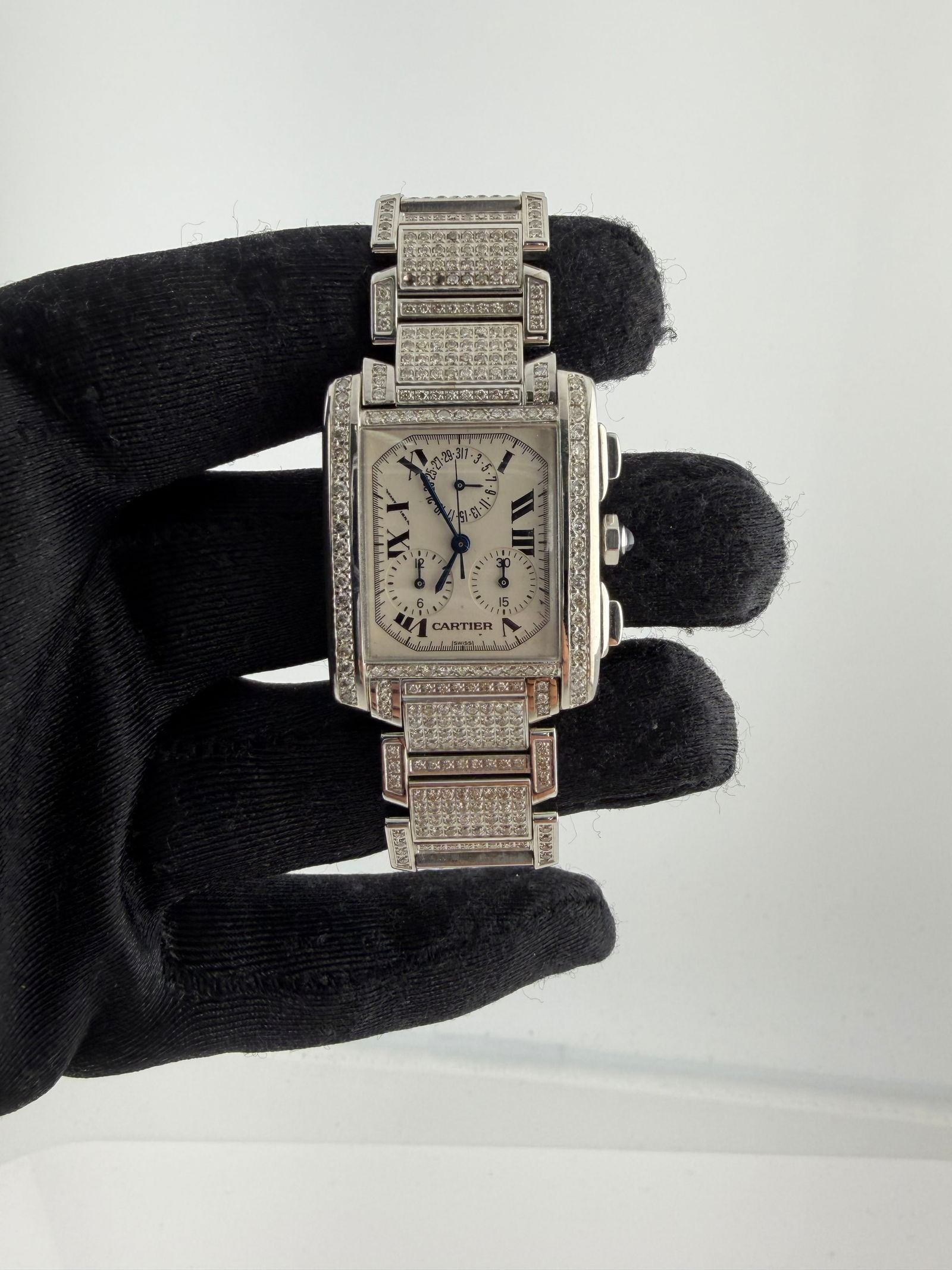 Tank Francaise Reference 2303 Unisex Watch White Dial Diamond Bezel and Bracelet: Tank Francaise Reference 2303 Unisex Watch White Dial Diamond Bezel and Bracelet This Cartier Tank Francaise model 2303 features a white dial, a diamond-set bezel, and a diamond bracelet. Designed for