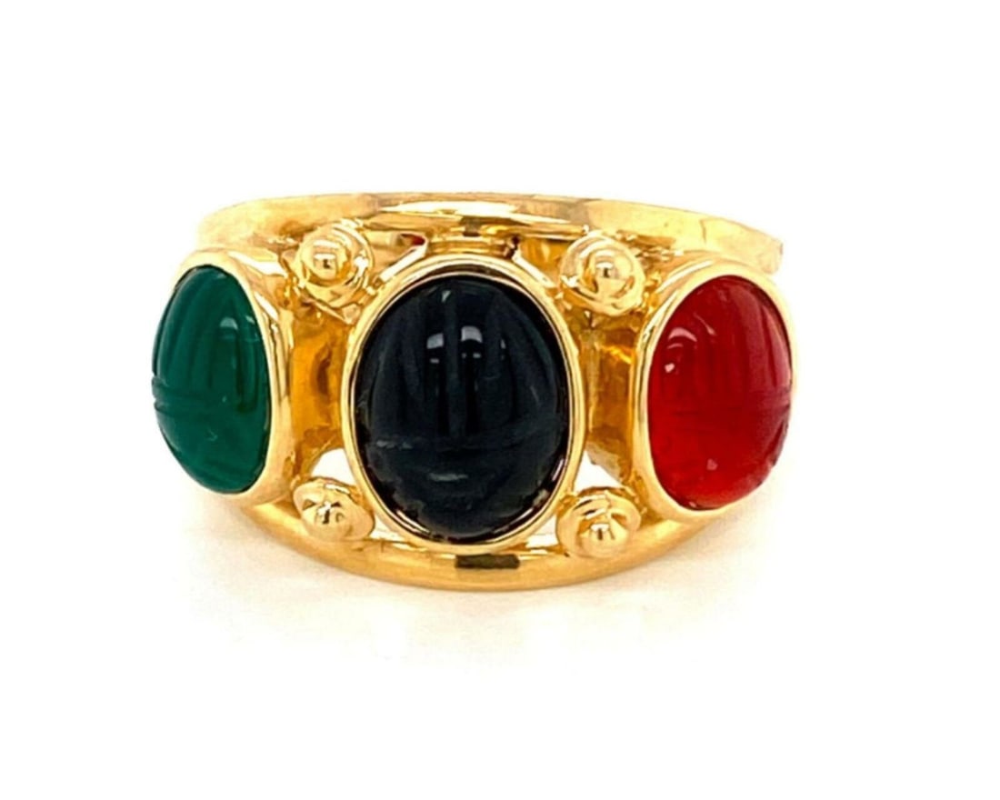 Vintage 14k Yellow Gold Scarab Ring with Carnelian and Onyx Size 8: Vintage 14k Yellow Gold Scarab Ring with Carnelian and Onyx Size 8 This vintage ring is crafted in solid 14k yellow gold and features a hand-carved carnelian scarab accented with green and black onyx