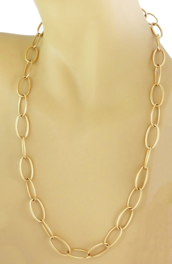 24.5 Inch 18k Yellow Gold Oval Link Chain Necklace by Hamilton: 24.5 Inch 18k Yellow Gold Oval Link Chain Necklace by Hamilton This large oval link chain necklace by Hamilton is crafted from 18k yellow gold with a satin finish. The necklace features substantial ov