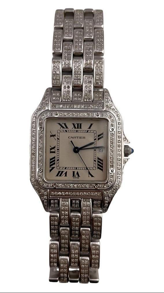 Diamond Bezel and Bracelet Panthere Jumbo Ref 1300 Ladies Watch White Dial: Diamond Bezel and Bracelet Panthere Jumbo Ref 1300 Ladies Watch White Dial This Cartier Panthere Jumbo watch features a white dial, a diamond-set bezel, and a diamond bracelet. Designed for ladies, it