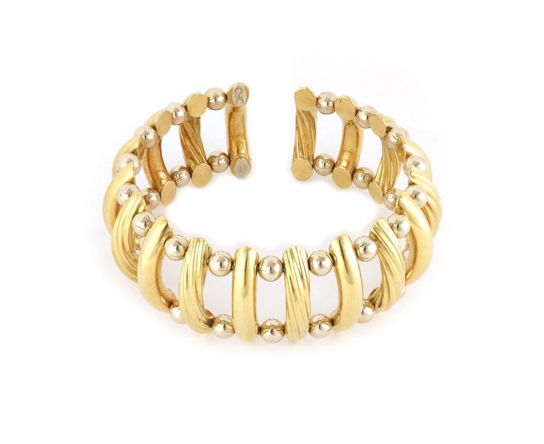 18k Yellow Gold Wide Dome Flex Cuff Bracelet with Gold Beads: 18k Yellow Gold Wide Dome Flex Cuff Bracelet with Gold Beads Elevate your accessory collection with this stunning 18k yellow gold open design wide dome flex cuff bracelet. This chic piece features alt