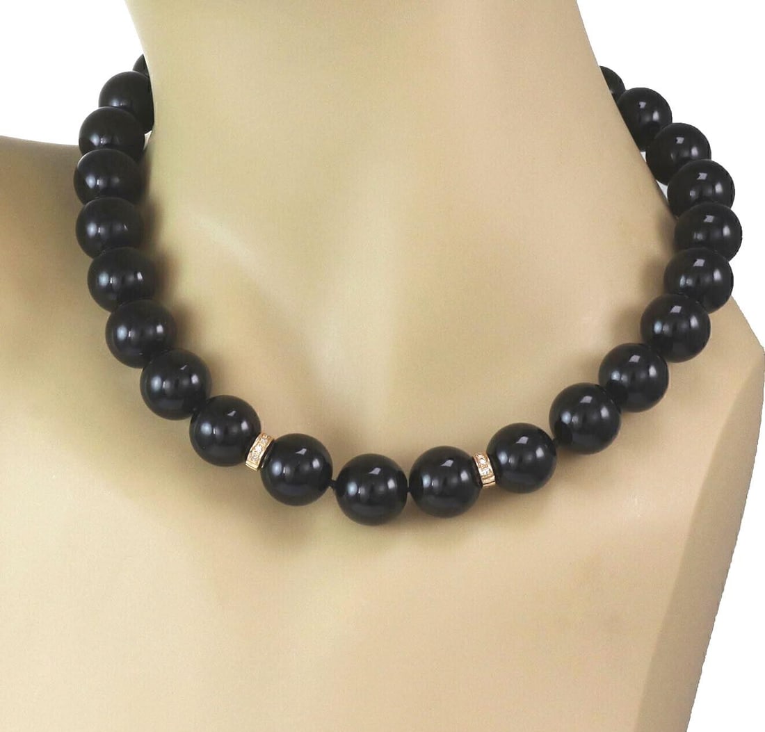 Vintage Beaded Necklace in 14k Gold with Diamonds and 13.5mm Onyx Beads: Vintage Beaded Necklace in 14k Gold with Diamonds and 13.5mm Onyx Beads This vintage necklace features genuine 13.5mm to 13.8mm onyx beads accented with sparkling diamonds, all set in 14k yellow gold.