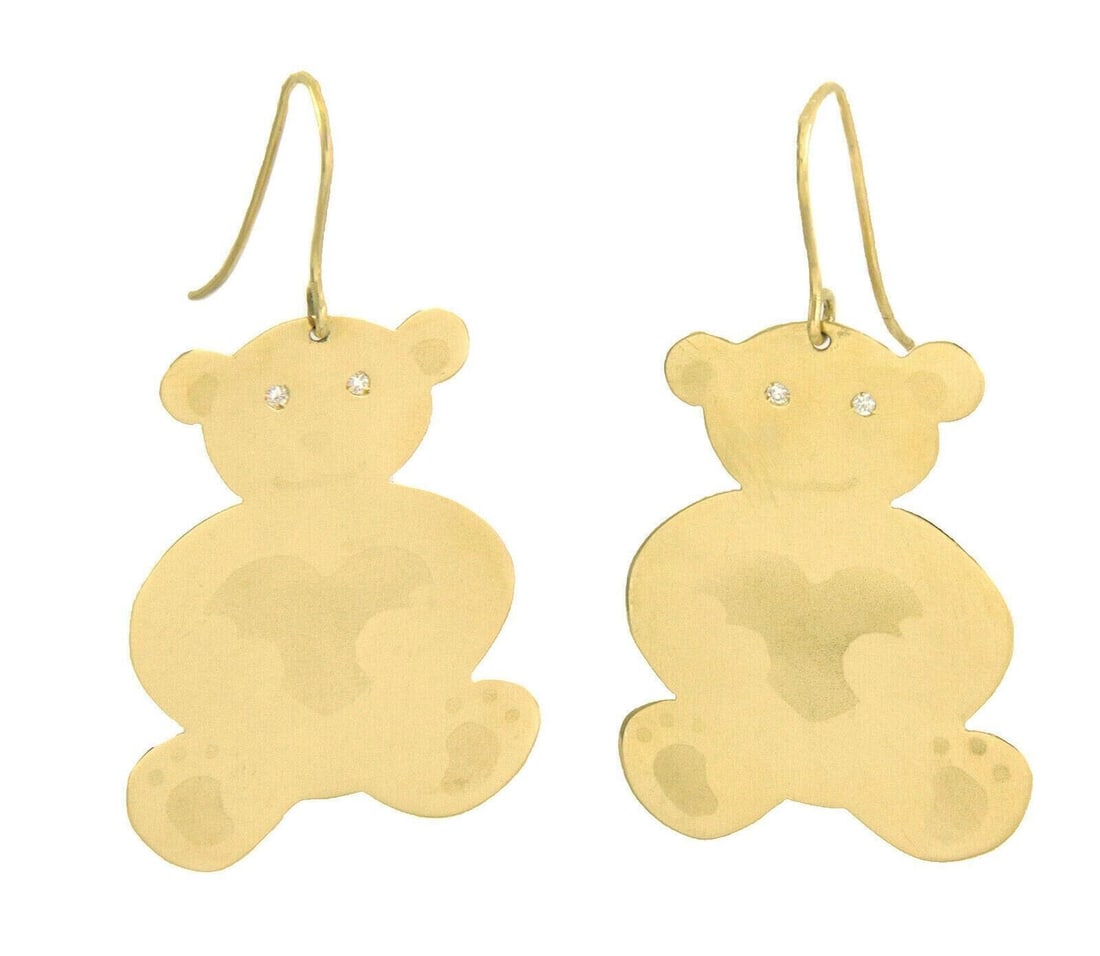 Bear Motif Dangle Earrings in 18k Yellow Gold with Diamonds by Roberto Coin: Bear Motif Dangle Earrings in 18k Yellow Gold with Diamonds by Roberto Coin These Roberto Coin dangle earrings are crafted from 18k yellow gold and feature a charming full-figure bear motif. Each earr