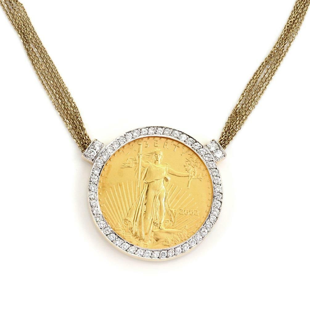 22k Liberty Gold Coin Pendant Necklace with Diamonds in 14k Gold: 22k Liberty Gold Coin Pendant Necklace with Diamonds in 14k Gold This stunning necklace features a striking 22k Liberty gold coin, weighing 1 oz and valued at $50, elegantly set in a large round frame