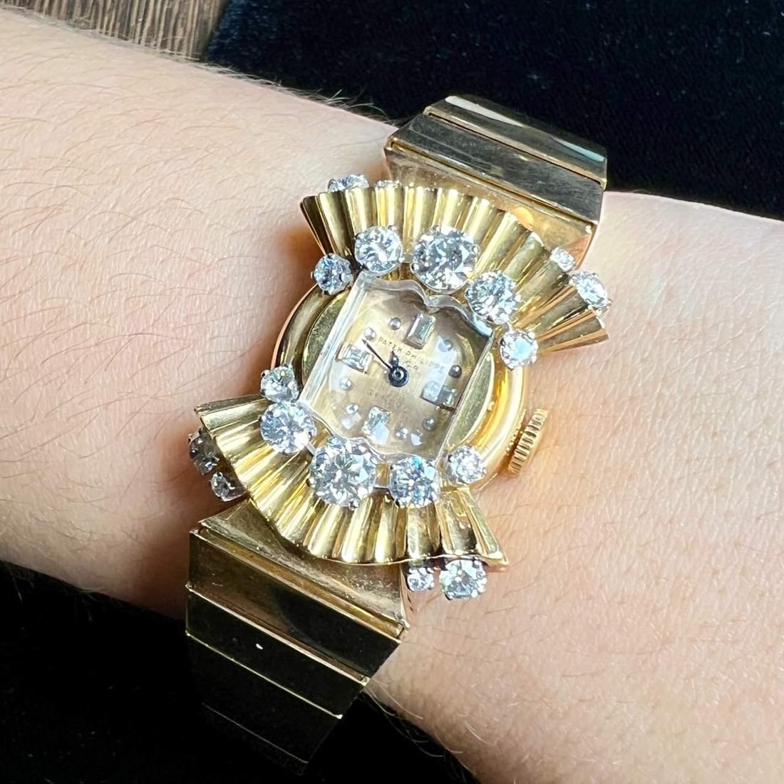 1960's Patek Philippe 18K Yellow Gold Cocktail Watch with 18 Diamonds: 1960's Patek Philippe 18K Yellow Gold Cocktail Watch with 18 Diamonds This exquisite 1960's Patek Philippe cocktail watch is crafted from 18K yellow gold and weighs 77.2 grams. The watch features a ma