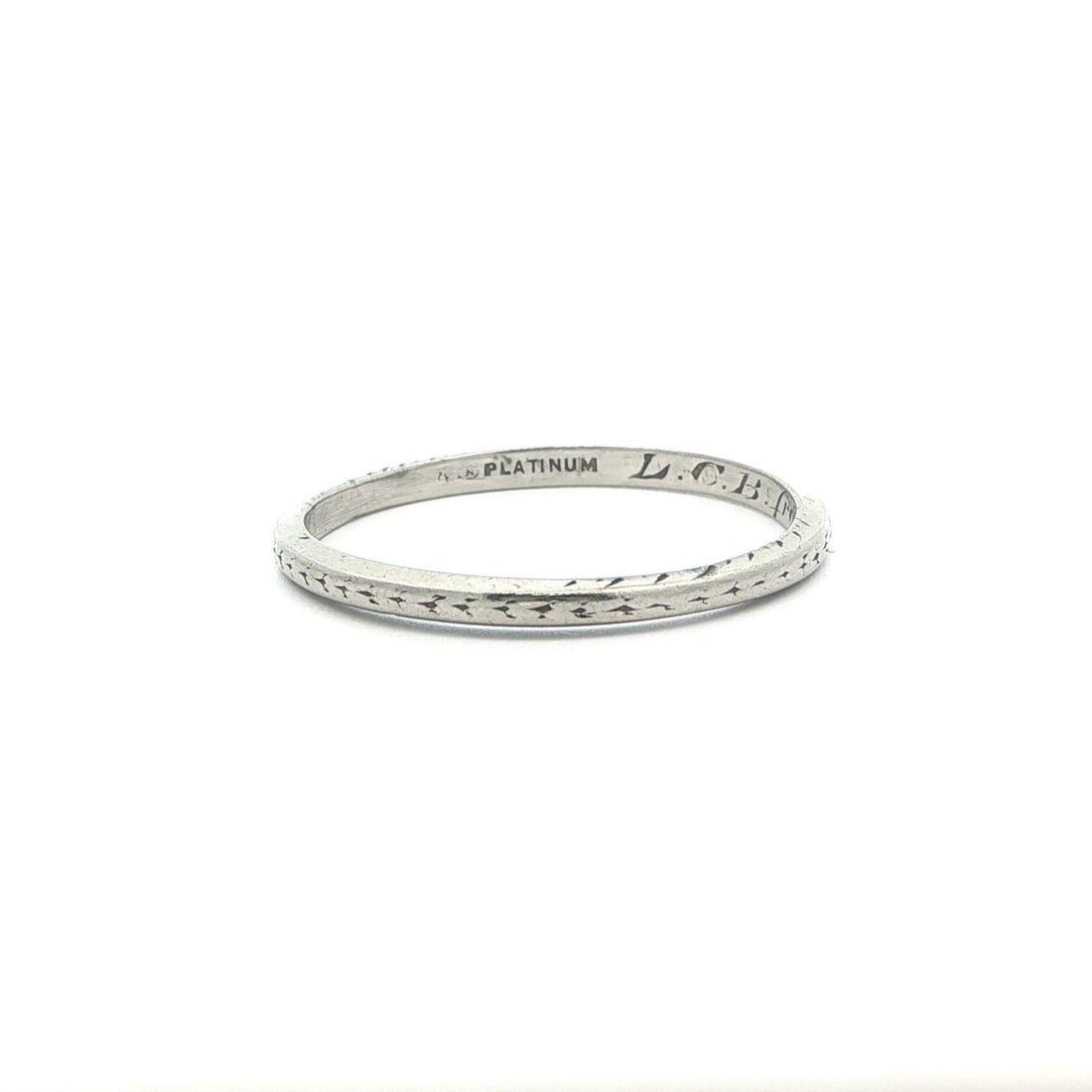 Platinum 1.6mm Art Deco Band Ring Size 6 Circa 1925: Platinum 1.6mm Art Deco Band Ring Size 6 Circa 1925 This antique Art Deco wedding band ring, dating to circa 1925, is crafted from solid platinum and features a slim 1.6mm wide stackable design. The r