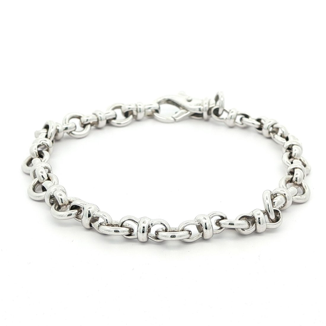 6.4mm Open Circle Link Solid 14k White Gold Stackable Bracelet 6.5 Inch: 6.4mm Open Circle Link Solid 14k White Gold Stackable Bracelet 6.5 Inch This elegant stackable bracelet features solid 14k white gold open circle links, offering a refined and versatile accessory. The