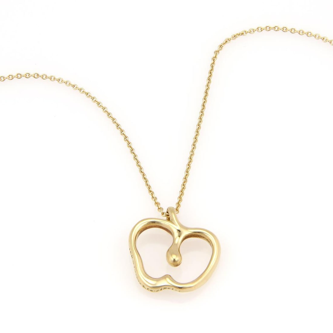 Tiffany & Co. Elsa Peretti 18k Yellow Gold Apple Pendant Necklace: Tiffany & Co. Elsa Peretti 18k Yellow Gold Apple Pendant Necklace Elevate your jewelry collection with this exquisite Tiffany & Co. necklace designed by Elsa Peretti. Crafted from 18k yellow gold