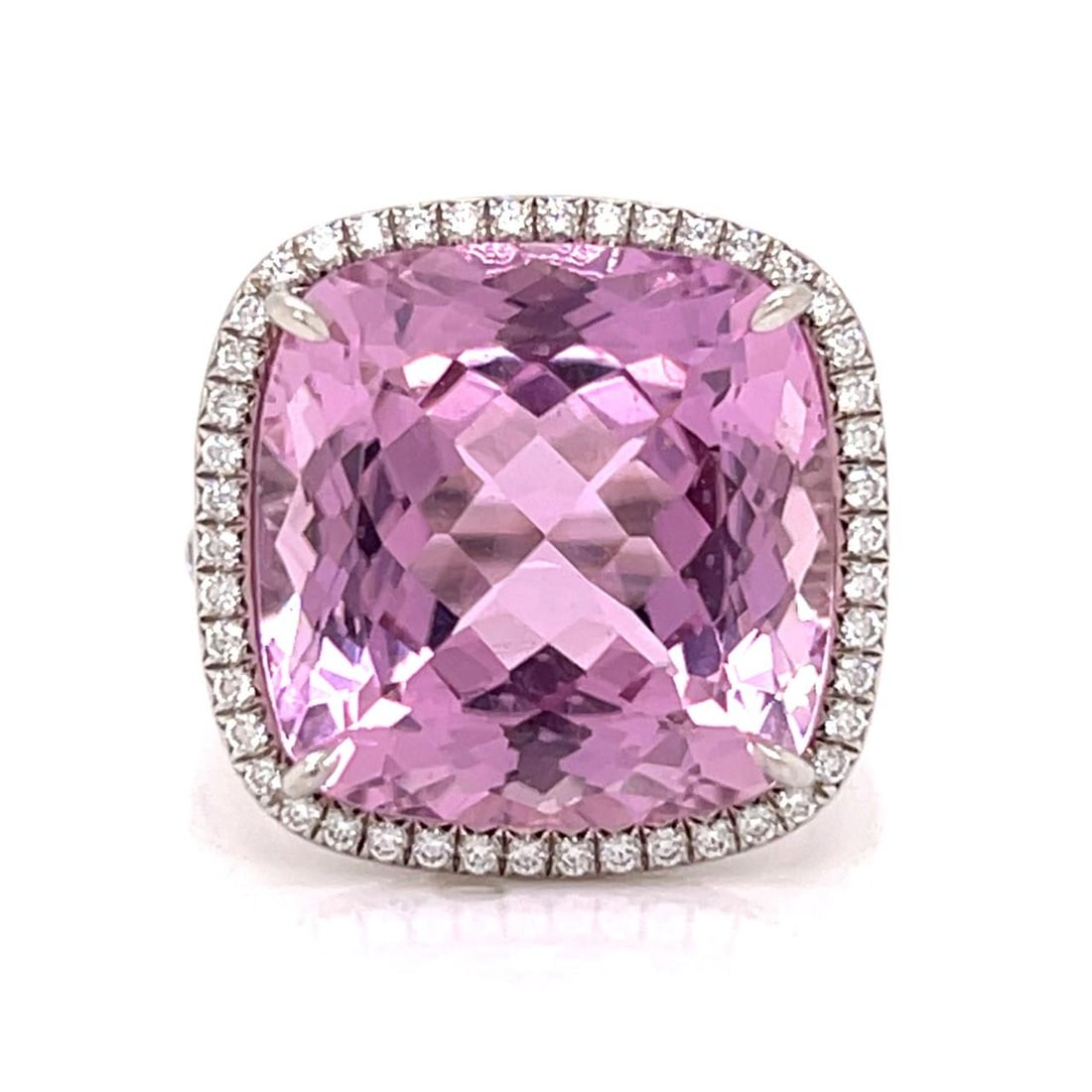 Platinum Ring with 14.50 Ct Kunzite and 104 Diamonds by Tiffany & Co.: Platinum Ring with 14.50 Ct Kunzite and 104 Diamonds by Tiffany & Co. This platinum ring features a central approximately 14.50 carat kunzite, accented by 104 diamonds totaling approximately 1.50 cara