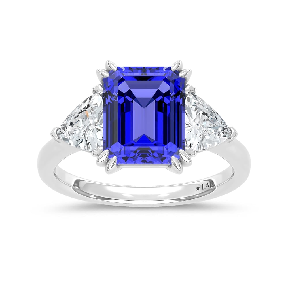 14K White Gold Lab Grown Diamond 5 7/8 Ct.Tw. Emerald Shape Recrystalized Blue sapphire Engagement: 14K White Gold Lab Grown Diamond 5 7/8 Ct.Tw. Emerald Shape Recrystalized Blue sapphire Engagement Ring (Center 4 1/2 ct) Exude refined elegance with this 14K white gold engagement ring, featuring a s
