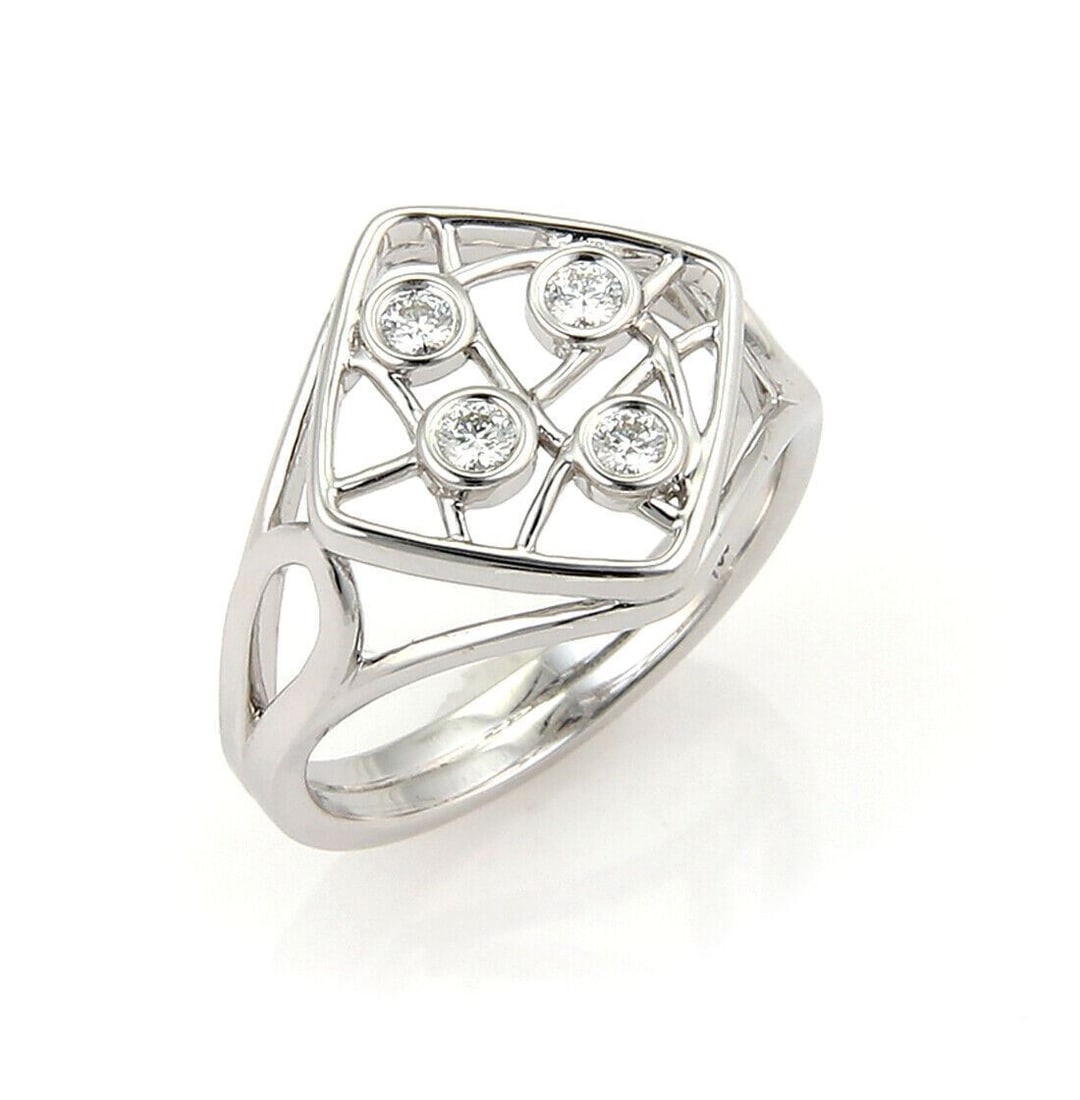18k White Gold Hearts On Fire Diamond Openwork Ring Size 6.5: 18k White Gold Hearts On Fire Diamond Openwork Ring Size 6.5 This Hearts On Fire ring features an elegant open design crafted from 18k white gold and set with sparkling diamonds. The ring is an origin