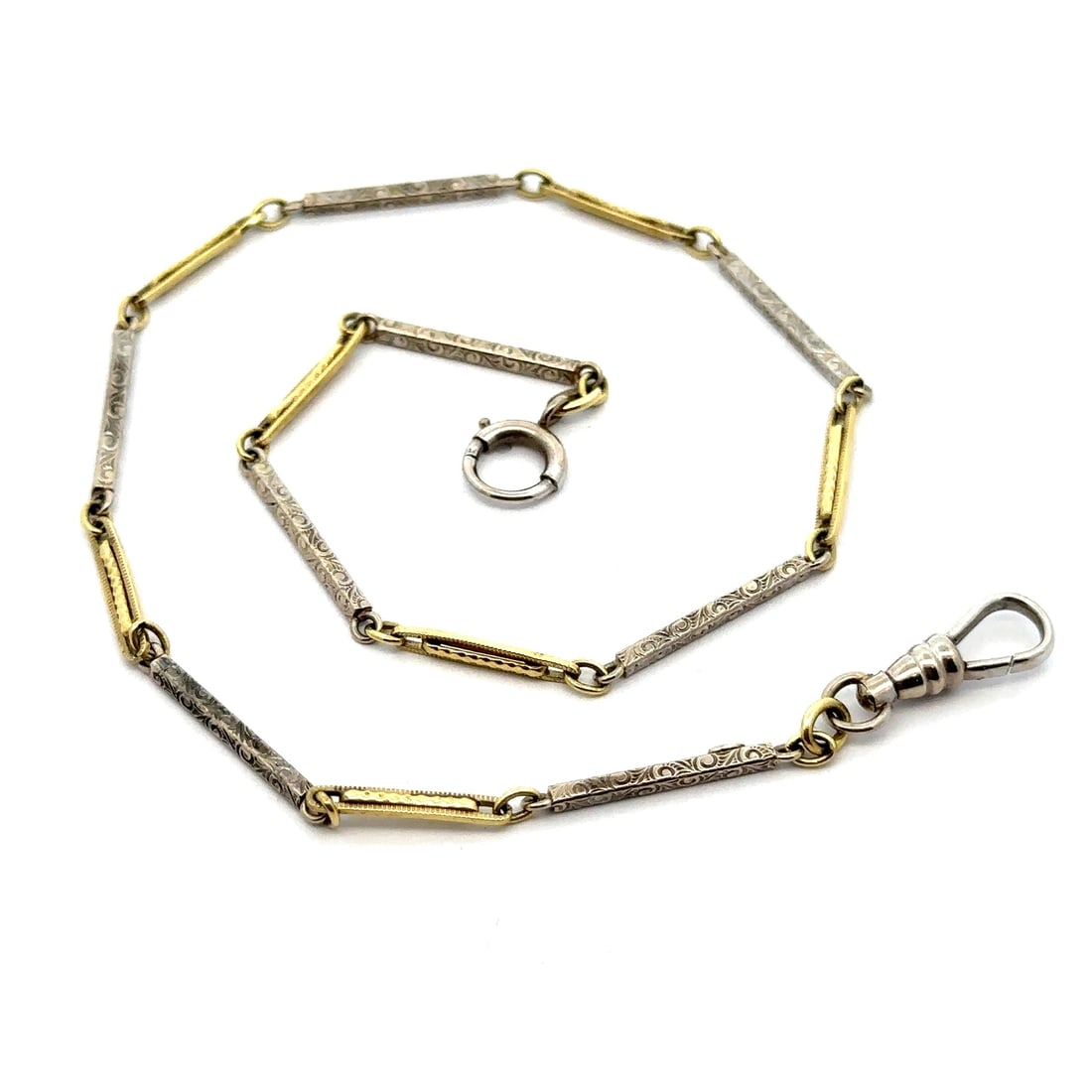 Antique Two Tone Gold Pocket Watch Chain 13-14k Unique Design: Antique Two Tone Gold Pocket Watch Chain 13-14k Unique Design This exquisite antique pocket watch chain showcases a unique two-tone design, expertly crafted from solid 13-14k yellow and white gold. Th