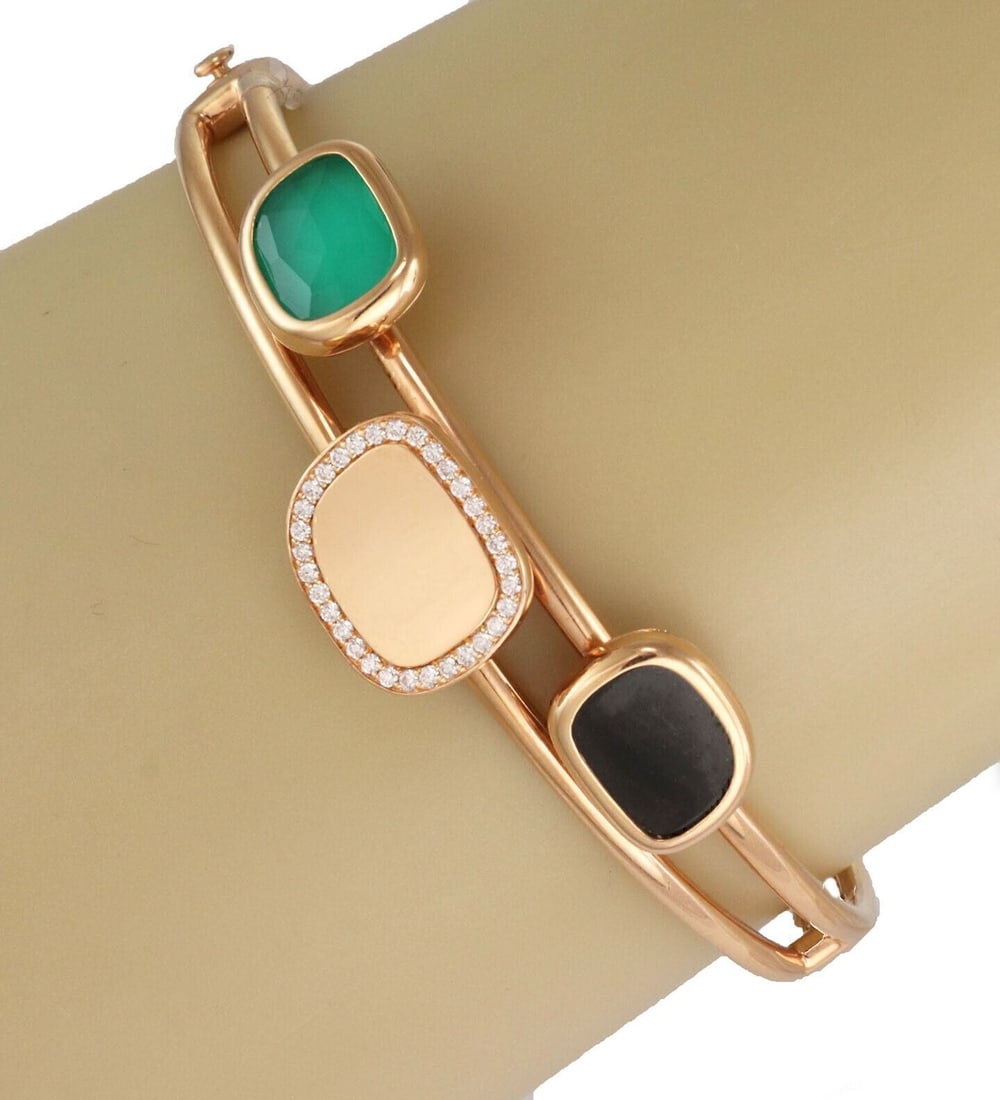 18k Rose Gold Bangle Bracelet with Jade and Diamonds by Roberto Coin: 18k Rose Gold Bangle Bracelet with Jade and Diamonds by Roberto Coin This Roberto Coin bangle bracelet showcases a striking combination of black jade, green agate, and sparkling diamonds set in 18k ro
