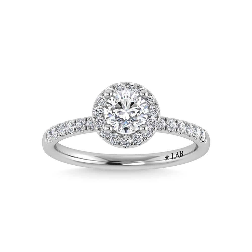 14K White Gold Lab Grown Diamond 1 1/4 Ct.Tw. Shank Round Shape Halo Engagement Ring (IGI Certified: 14K White Gold Lab Grown Diamond 1 1/4 Ct.Tw. Shank Round Shape Halo Engagement Ring (IGI Certified Center 1ct) Celebrate your forever moment with the timeless brilliance of our Halo Diamond Engagemen