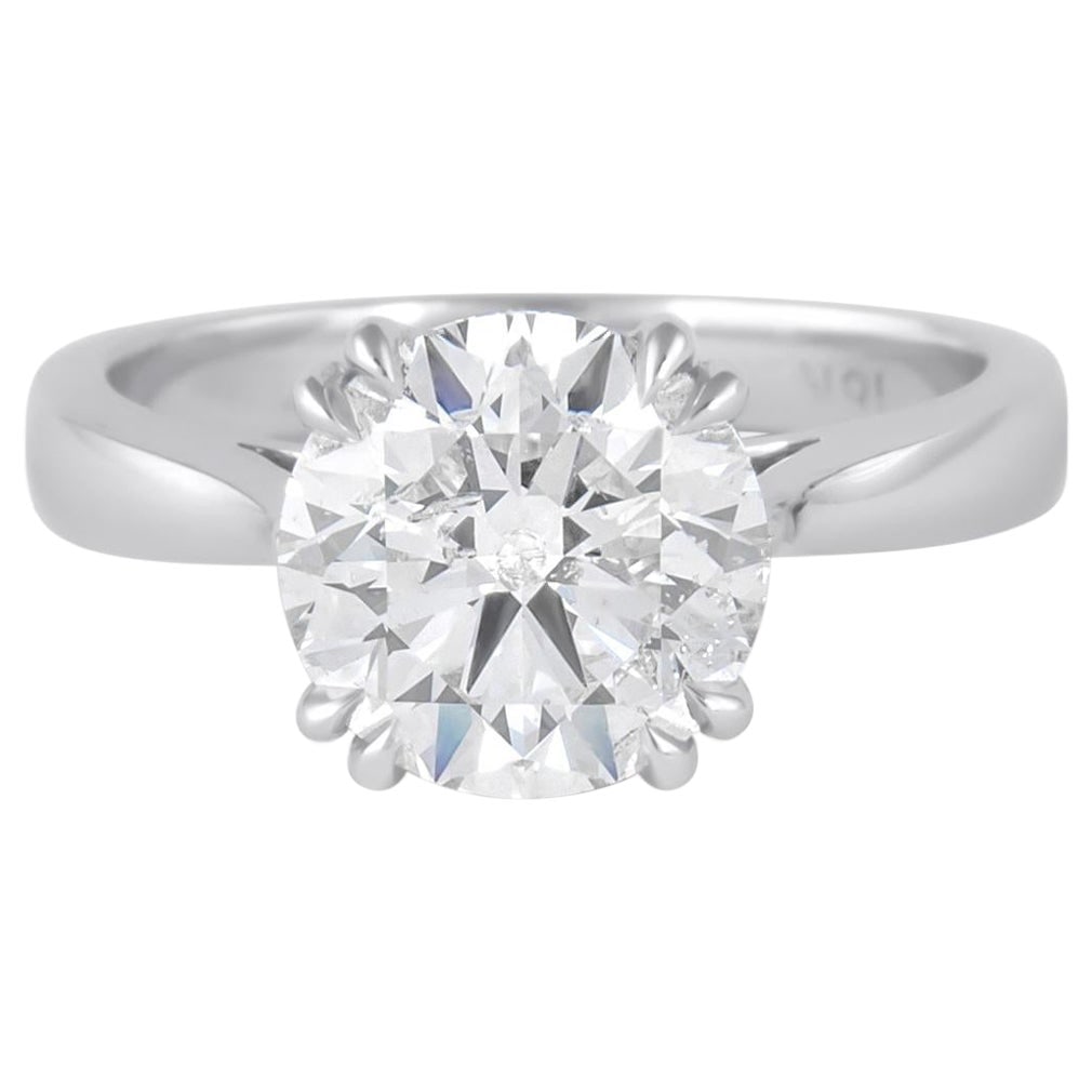 HRD Certified 3.02ct Round Brilliant Diamond Engagement Ring 18k White Gold: HRD Certified 3.02ct Round Brilliant Diamond Engagement Ring 18k White Gold This stunning engagement ring features a classic solitaire design with a 3.02 carat round brilliant diamond, securely set