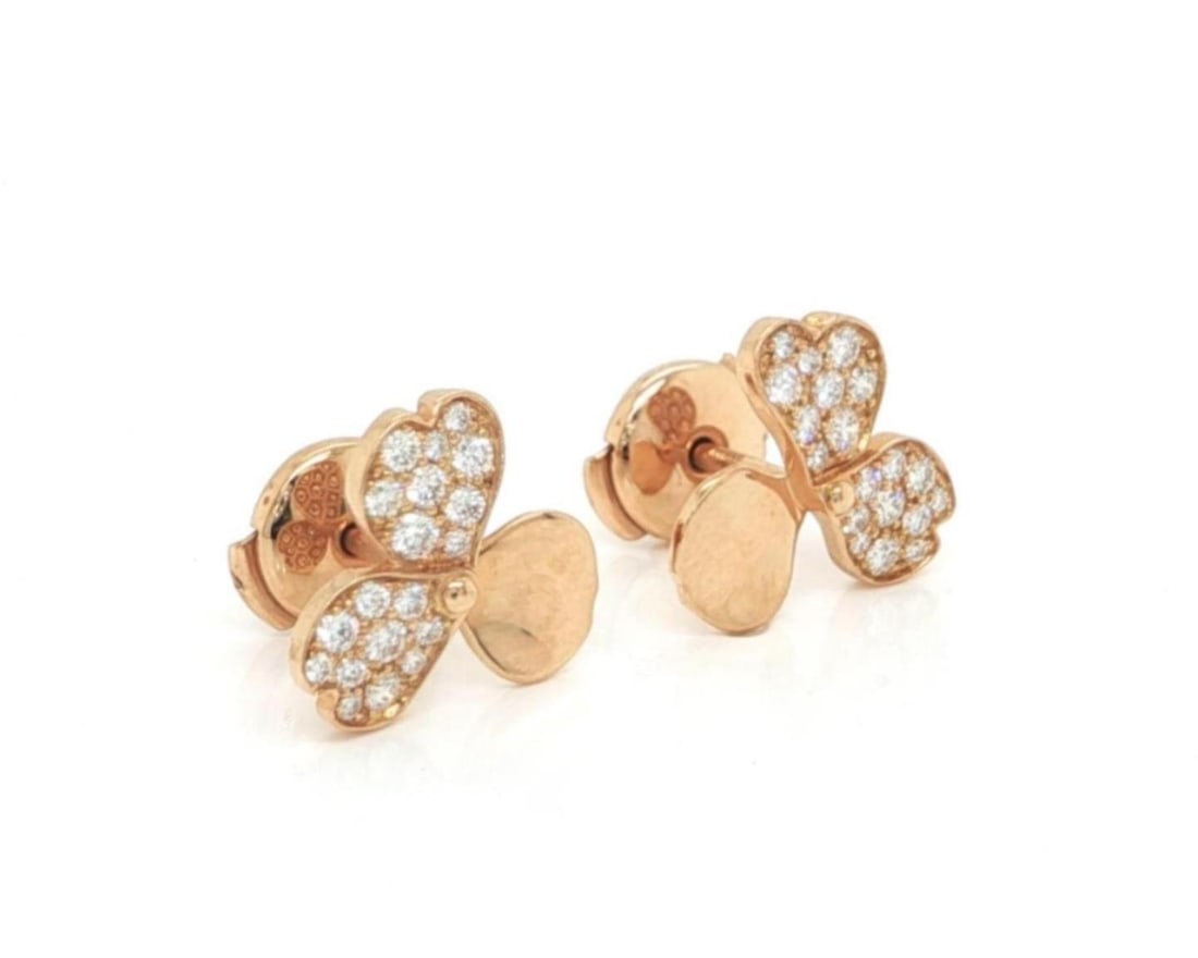 Tiffany Paper Flowers 18k Rose Gold Diamond Floral Stud Earrings: Tiffany Paper Flowers 18k Rose Gold Diamond Floral Stud Earrings These Tiffany & Co. Paper Flower stud earrings are crafted from solid 18k rose gold and feature a delicate flower design set with natur
