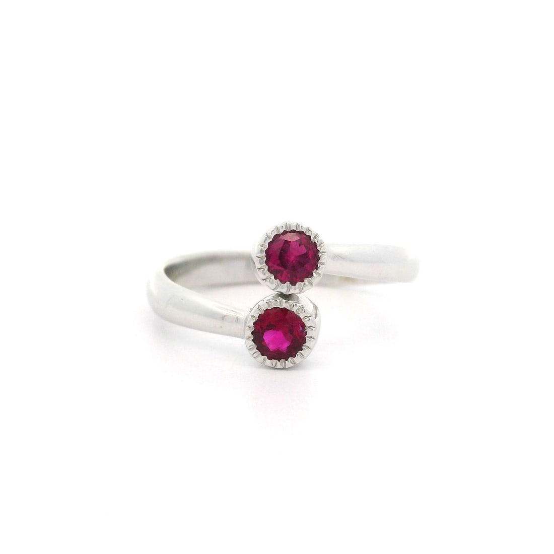 14k White Gold 0.44ctw Ruby Milgrain Bypass Twin Band Ring: 14k White Gold 0.44ctw Ruby Milgrain Bypass Twin Band Ring Adorn your finger with this stunning bypass twin band ring crafted from 14k solid white gold. Featuring two natural round brilliant cut rubie