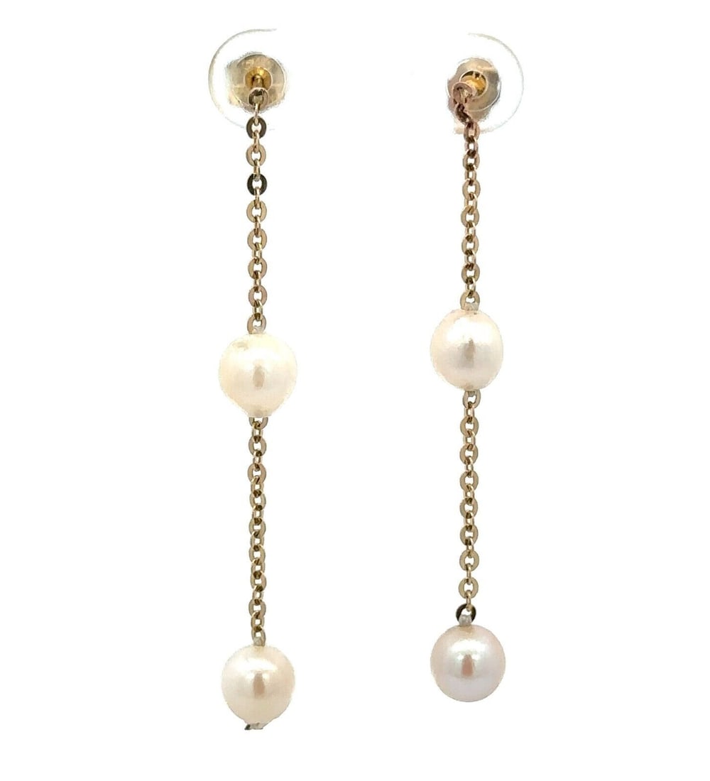 Vintage 14K Yellow Gold Baroque Round Pearl Drop Earrings: Vintage 14K Yellow Gold Baroque Round Pearl Drop Earrings Elevate your style with these exquisite Vintage 14K Yellow Gold Baroque & Round Cultured Pearl Drop Dangle Earrings. Crafted from solid 14K ye
