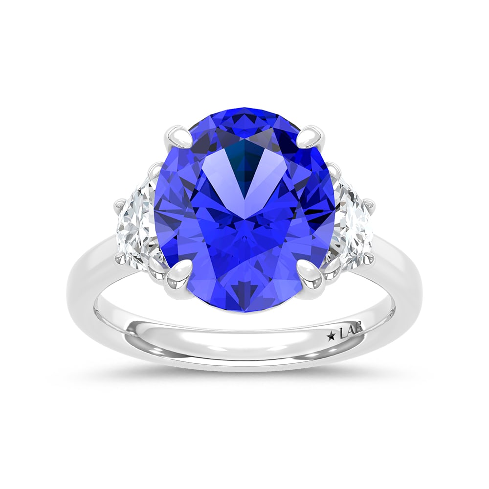 14K White Gold Lab Grown Diamond 7 1/5 Ct.Tw. Oval Shape Recrystalized Blue Sapphire Engagement Ring: 14K White Gold Lab Grown Diamond 7 1/5 Ct.Tw. Oval Shape Recrystalized Blue Sapphire Engagement Ring (Center 6 5/8 ct) Exude timeless sophistication with this 14K white gold engagement ring. Its cente