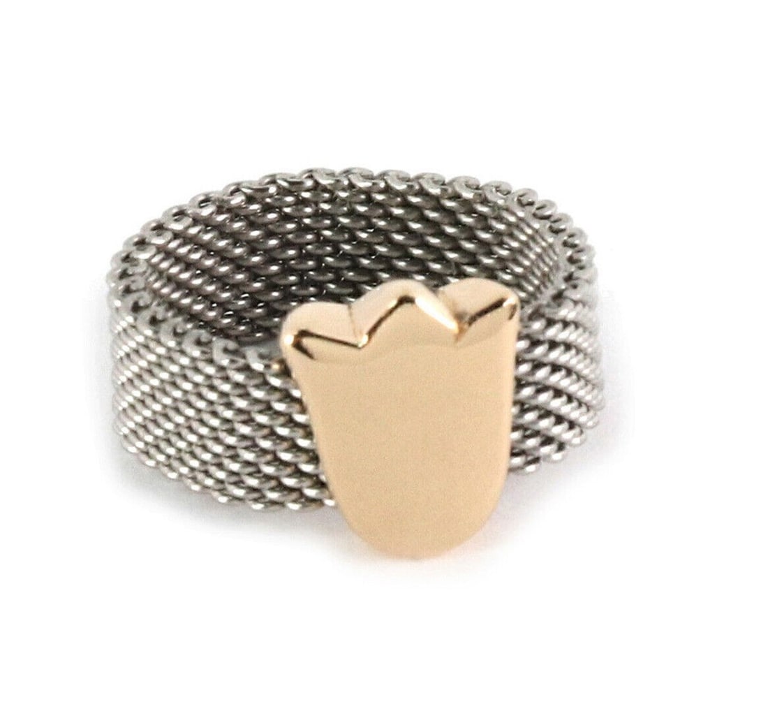 Tous Tulip Charm Mesh Flex Ring in 18k Gold and Stainless Steel Size 6: Tous Tulip Charm Mesh Flex Ring in 18k Gold and Stainless Steel Size 6 This authentic ring features a flexible mesh band crafted from stainless steel, accented with a tulip charm in 18k yellow gold. T