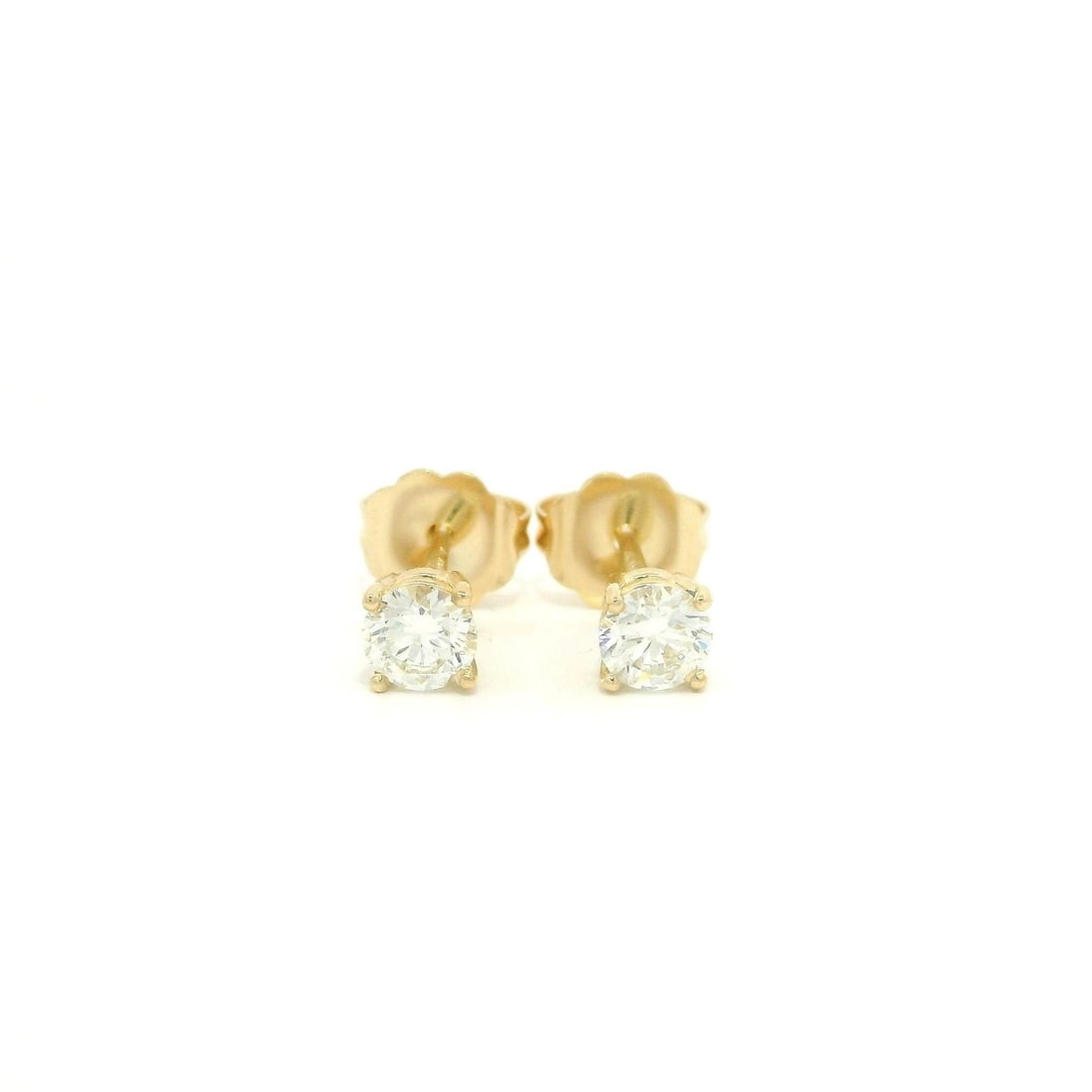 Petite 14k White Gold 0.42ctw Diamond Stud Earrings G VS1: Petite 14k White Gold 0.42ctw Diamond Stud Earrings G VS1 These exquisite petite stud earrings are crafted from solid 14k white gold, featuring two natural genuine diamonds elegantly set in a prong st