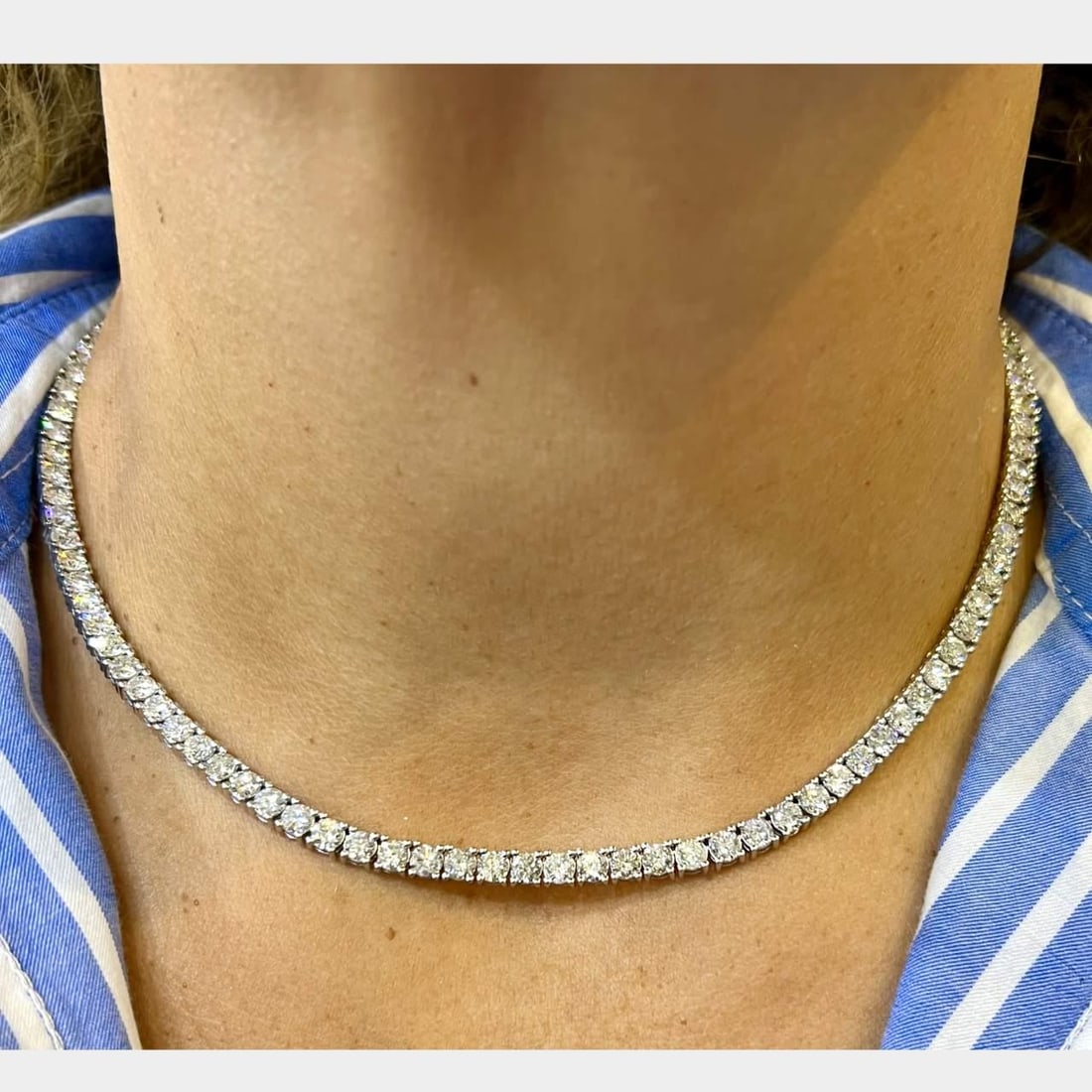 14K White Gold 19.40 Ct Diamond Tennis Necklace 104 Diamonds F-H SI1-I1: 14K White Gold 19.40 Ct Diamond Tennis Necklace 104 Diamonds F-H SI1-I1 This exquisite tennis necklace is crafted from 14K white gold and features a stunning array of 104 diamonds, totaling approximat