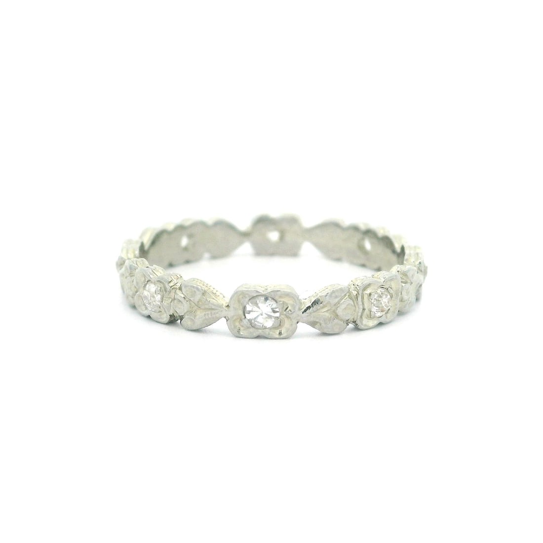 Antique 18k White Gold Diamond Floral Band Ring 0.12ct Size 5.5: Antique 18k White Gold Diamond Floral Band Ring 0.12ct Size 5.5 This exquisite antique band ring features a stunning floral design crafted from solid 18k white gold. Adorned with eight natural genuine