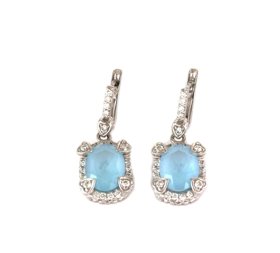 Dangle Earrings With Diamonds Frosted Blue Topaz 18k White Gold Judith Ripka: Dangle Earrings With Diamonds Frosted Blue Topaz 18k White Gold Judith Ripka These Judith Ripka dangle earrings feature frosted blue topaz gemstones accented by 0.45 carats of diamonds, all set in 18k