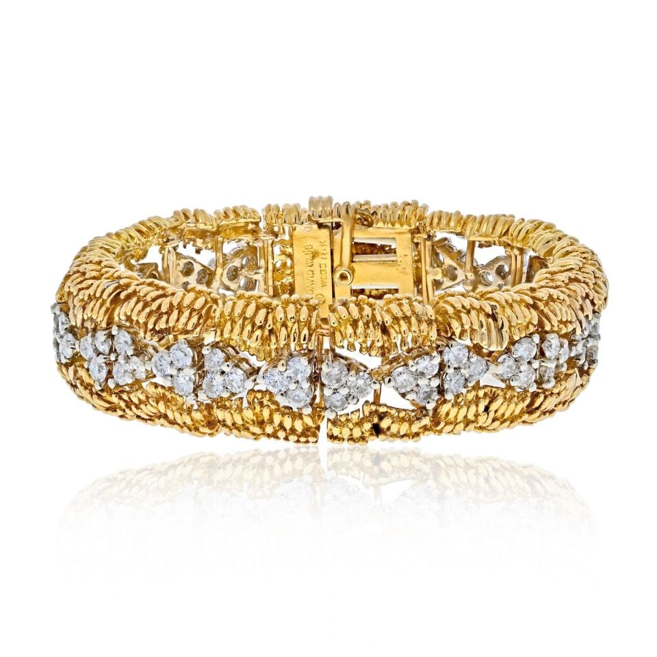 David Webb 1960s Platinum 18K Gold Diamond Openwork Bracelet 8 Cts: David Webb 1960s Platinum 18K Gold Diamond Openwork Bracelet 8 Cts This exquisite David Webb bracelet, a stunning example of 1960's craftsmanship, is designed in a combination of platinum and 18K yell