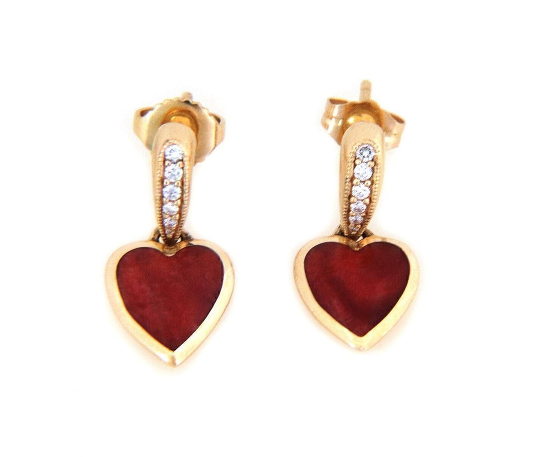 Heart Shaped Spiny Oyster Shell Dangle Earrings in 14k Yellow Gold with Diamonds: Heart Shaped Spiny Oyster Shell Dangle Earrings in 14k Yellow Gold with Diamonds These dangle earrings by Kabana are crafted from 14k yellow gold and feature heart-shaped drops made from red spiny oys