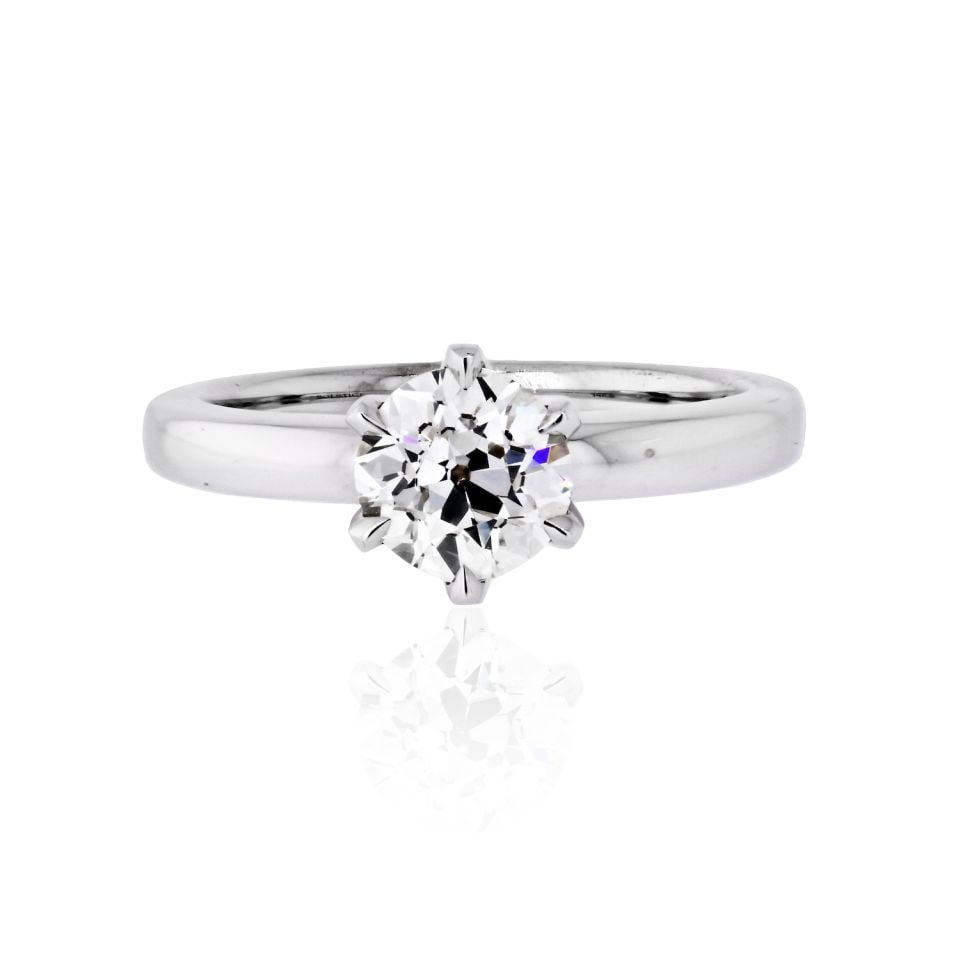 14K White Gold Solitaire Engagement Ring 1.33ct GIA Certified Diamond: 14K White Gold Solitaire Engagement Ring 1.33ct GIA Certified Diamond This exquisite solitaire engagement ring beautifully combines modern elegance with vintage charm. It showcases a stunning 1.33 car