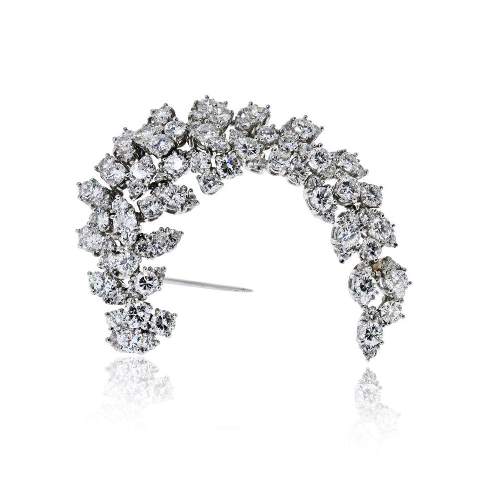 Estate Platinum Brooch with 6.00 Carat Diamond Floral Spray Design: Estate Platinum Brooch with 6.00 Carat Diamond Floral Spray Design This estate brooch is expertly crafted in platinum and features a sophisticated diamond spray motif. Set with approximately 6.00