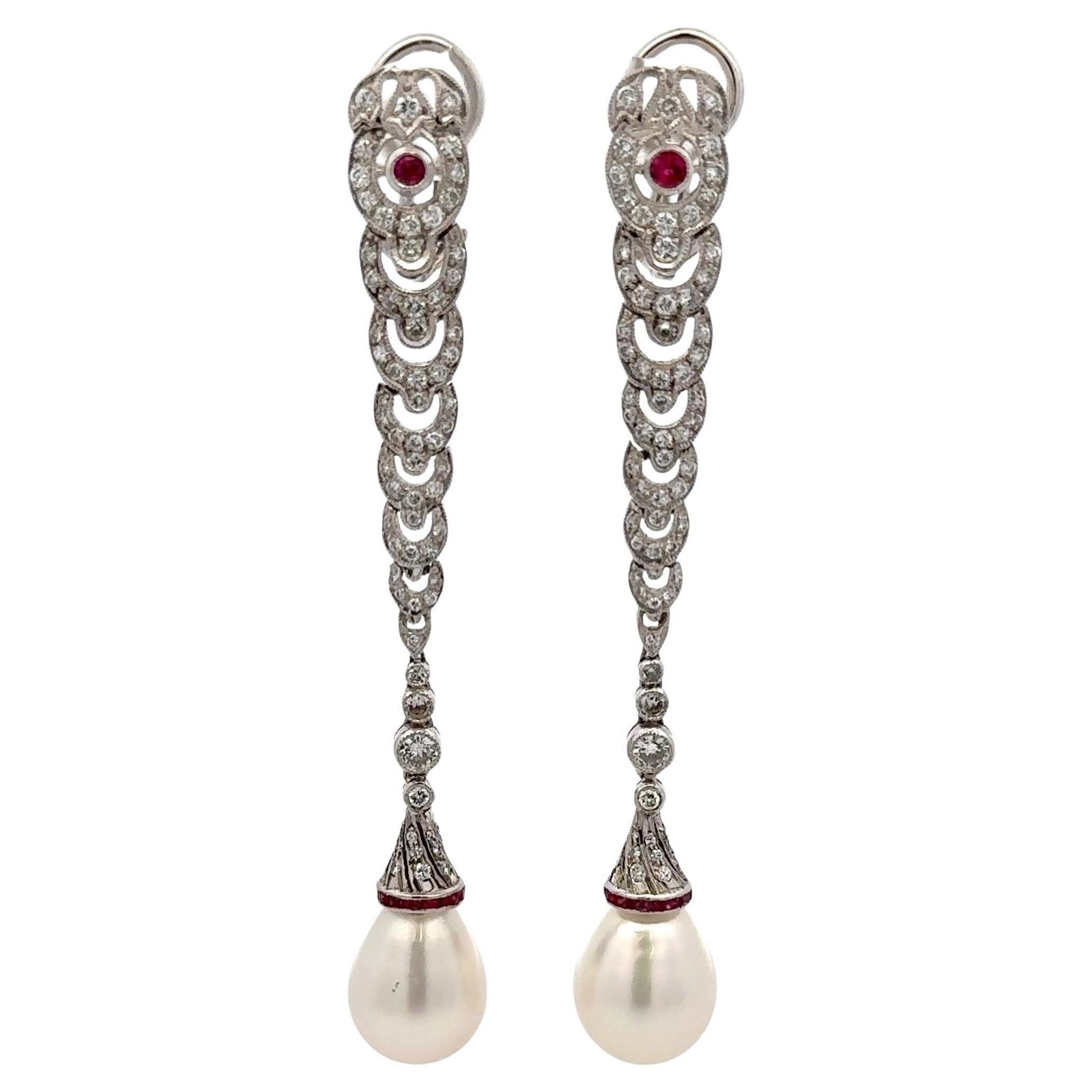 Harbor Diamonds Art Deco Long Drop Earrings 1.50 Carats 18K White Gold Ruby: Harbor Diamonds Art Deco Long Drop Earrings 1.50 Carats 18K White Gold Ruby These exquisite Art Deco long drop earrings showcase a stunning combination of round diamonds and vibrant rubies, set in lux