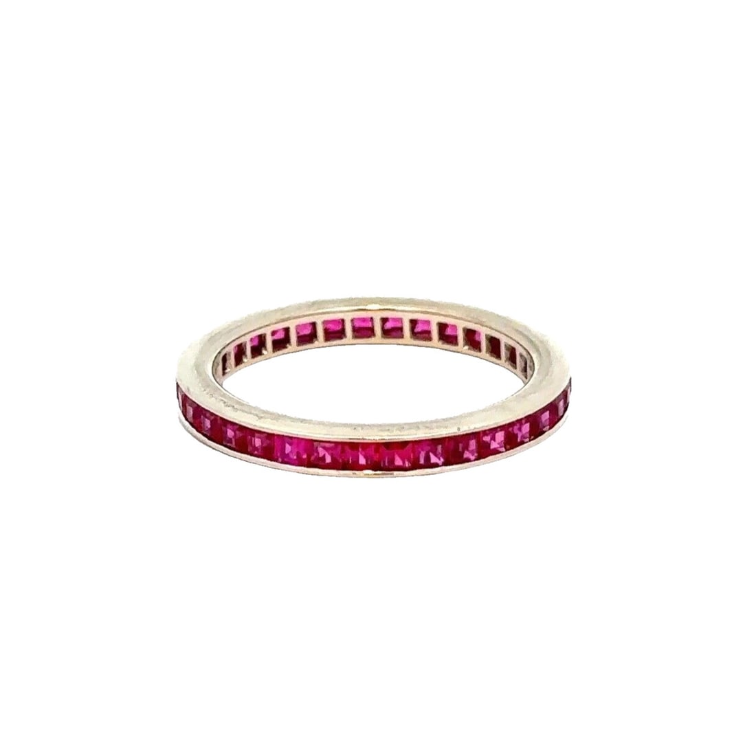 14K Gold Channel Set Square Cut Lab Created Ruby Eternity Stack Band Ring: 14K Gold Channel Set Square Cut Lab Created Ruby Eternity Stack Band Ring This exquisite 14K Gold Channel Set Square Step Cut Lab Created Ruby Eternity Stack Band Ring features a stunning array of viv