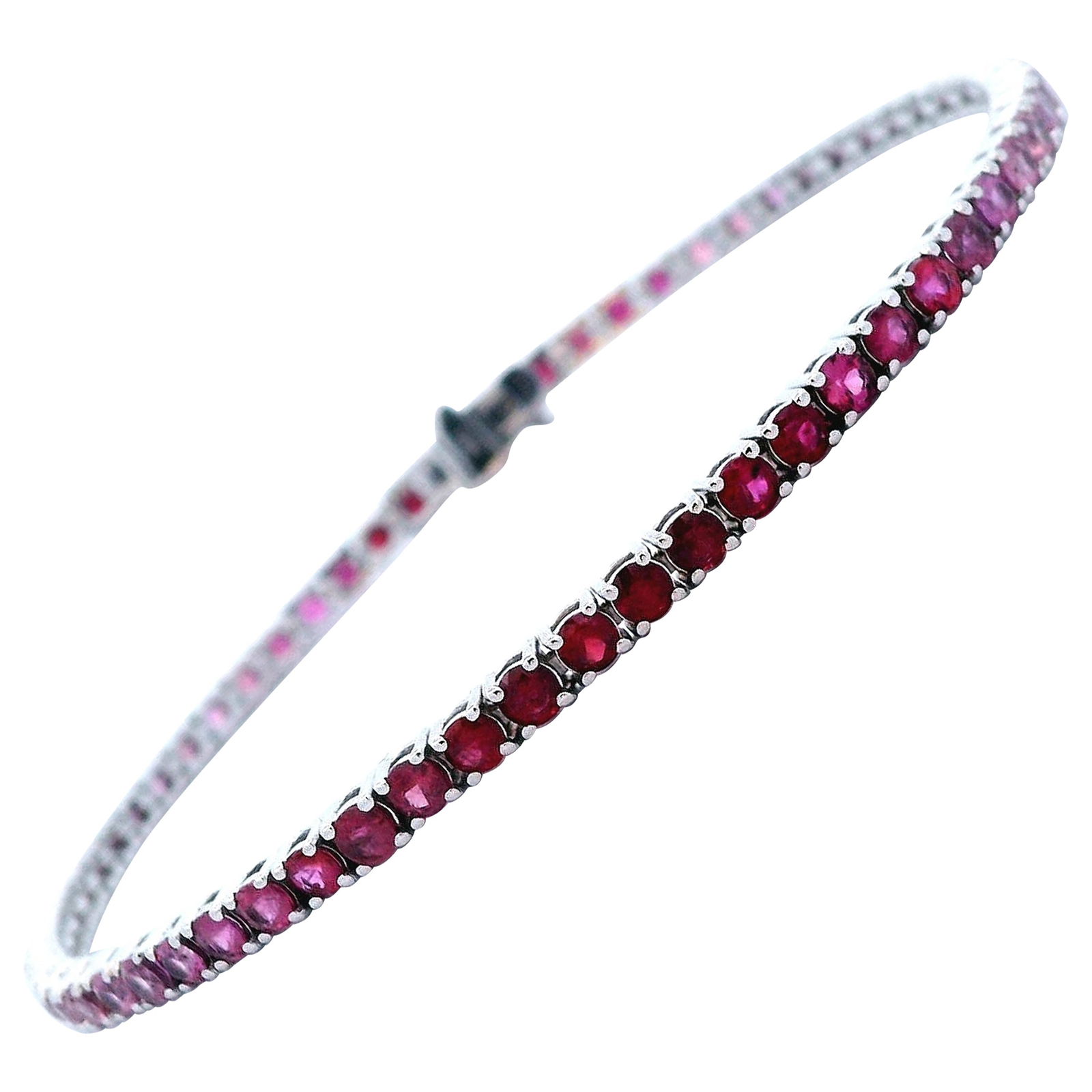 4.72ct Ruby Pink Sapphire Tennis Bracelet in 18k White Gold: 4.72ct Ruby Pink Sapphire Tennis Bracelet in 18k White Gold This stunning tennis bracelet features a harmonious blend of 4.72 carats of round cut rubies and pink sapphires, elegantly set in 18k white