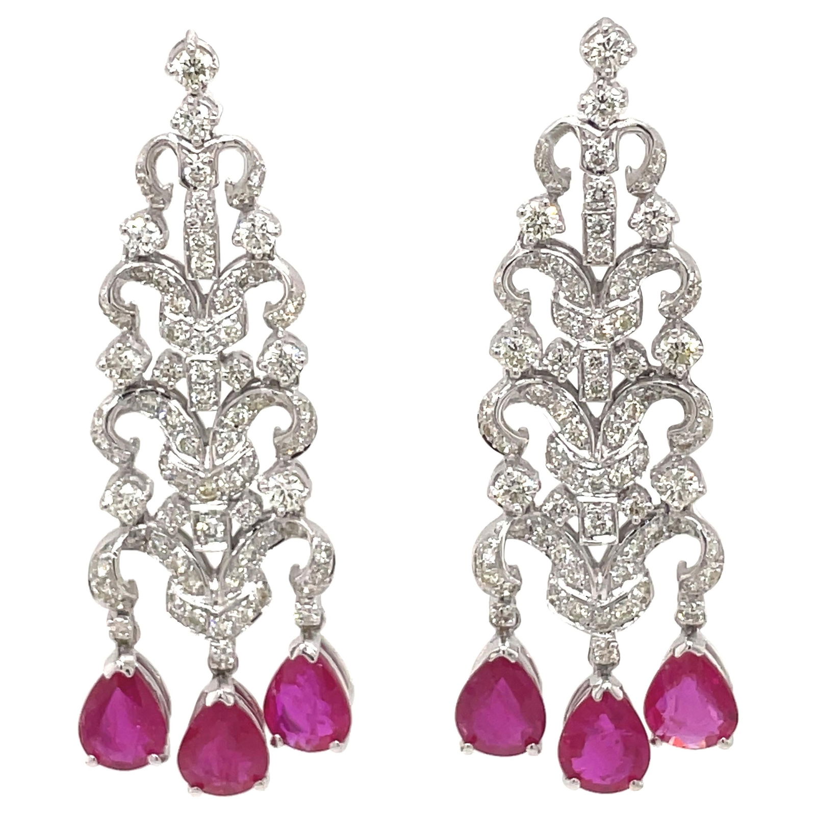 Edwardian Chandelier Earrings 7.12ct Ruby 3.06ct Diamond 18k White Gold: Edwardian Chandelier Earrings 7.12ct Ruby 3.06ct Diamond 18k White Gold These stunning Edwardian-inspired chandelier earrings are crafted in luxurious 18k white gold and feature a captivating design.