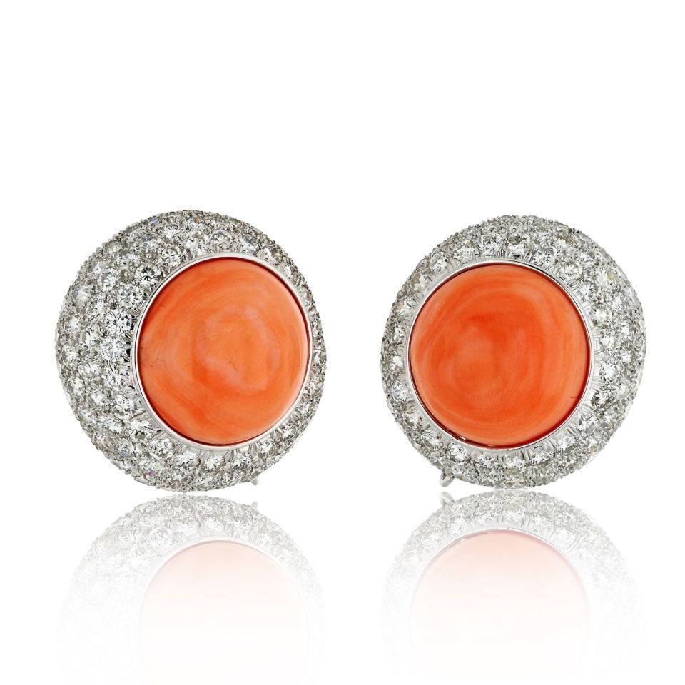 David Webb 18K White Gold Coral Diamond Clip Earrings 12.5cttw: David Webb 18K White Gold Coral Diamond Clip Earrings 12.5cttw These exquisite clip earrings showcase a stunning combination of button coral and diamonds, crafted from 18K white gold. Each earring