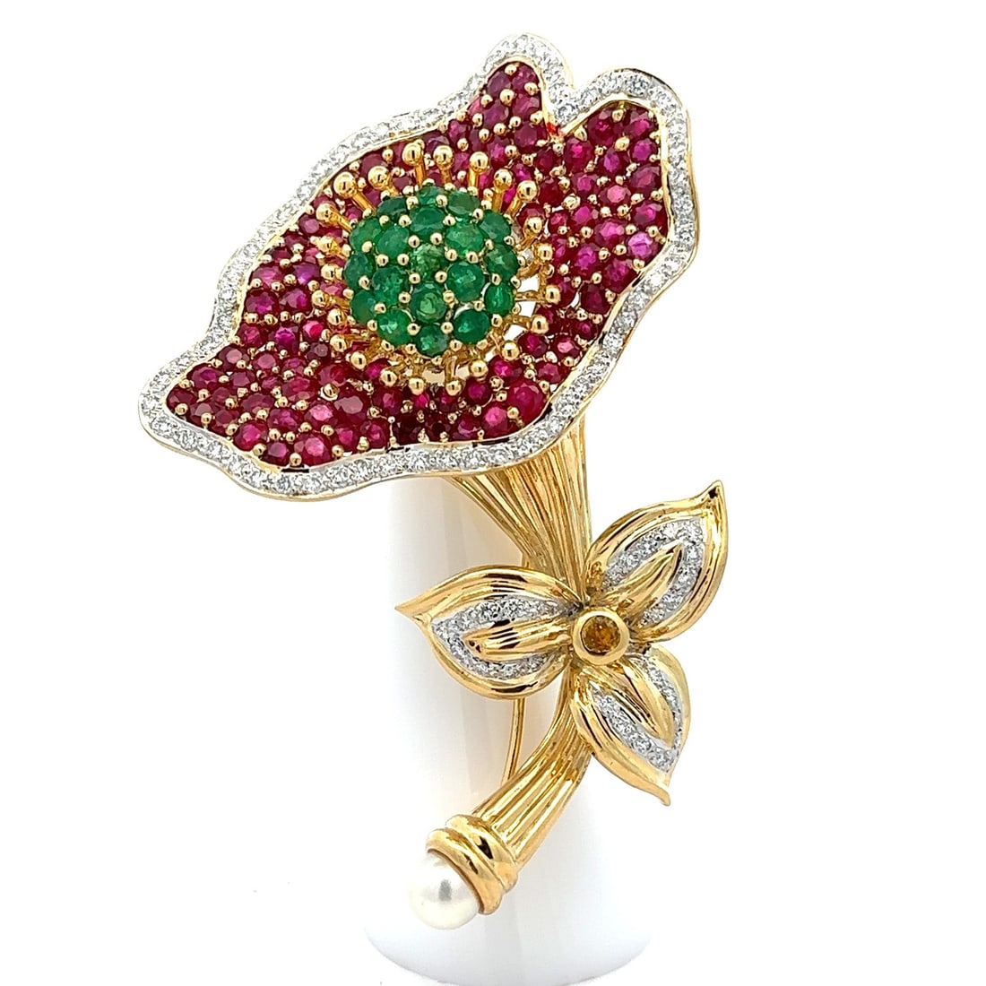 Vintage 18k Gold Flower Brooch with Diamonds Emeralds Pearls Rubies: Vintage 18k Gold Flower Brooch with Diamonds Emeralds Pearls Rubies This stunning vintage brooch is a captivating floral design crafted from solid 18k yellow and white gold. It features a luxurious ar