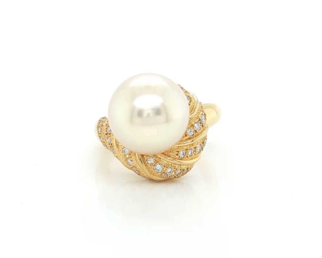 18k Yellow Gold Mikimoto Pearl and Diamond Swirl Cocktail Ring Size 5.5: 18k Yellow Gold Mikimoto Pearl and Diamond Swirl Cocktail Ring Size 5.5 This Mikimoto cocktail ring exemplifies timeless elegance and craftsmanship. Crafted from 18k yellow gold, the ring features a f