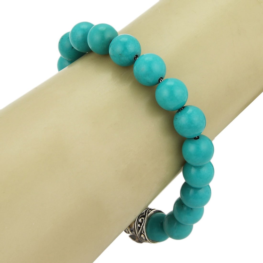 9 Inch Sterling Silver Beaded Bracelet with 10mm Turquoise by Stephen Webster: 9 Inch Sterling Silver Beaded Bracelet with 10mm Turquoise by Stephen Webster This Stephen Webster bracelet features 10mm turquoise beads accented with 925 sterling silver. The bracelet measures 9 inc