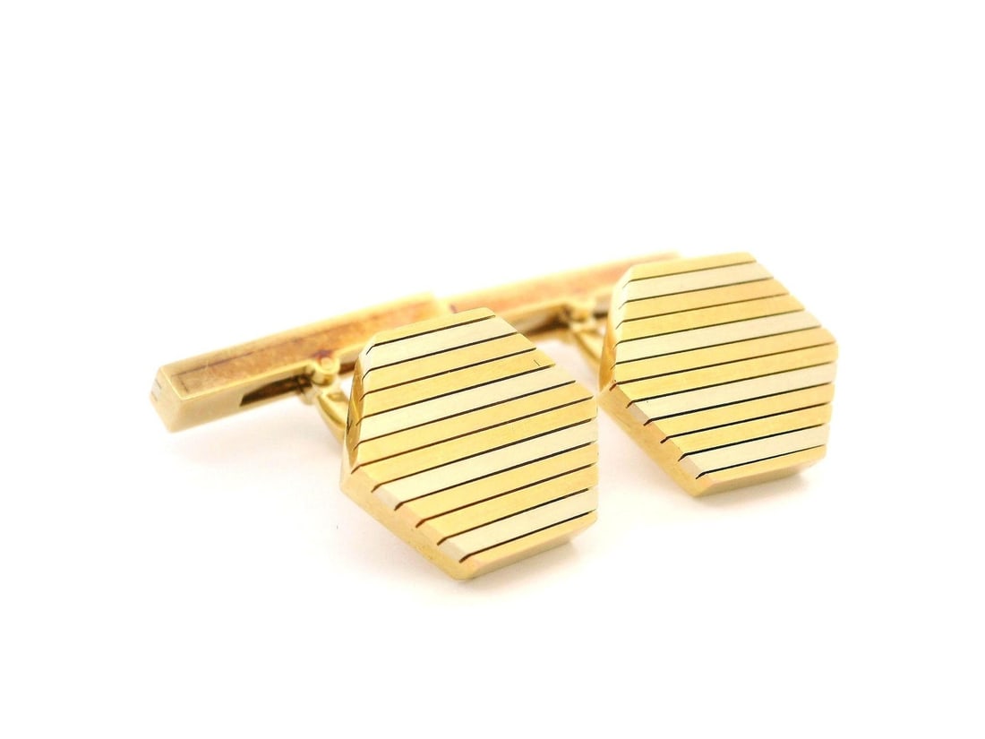 Estate Cartier 18k Tri-Color Gold Hexagon Cufflinks with Swivel Back: Estate Cartier 18k Tri-Color Gold Hexagon Cufflinks with Swivel Back These Estate Cartier cufflinks are crafted from solid 18k yellow gold, featuring elegant accents of white and rose gold. The unique