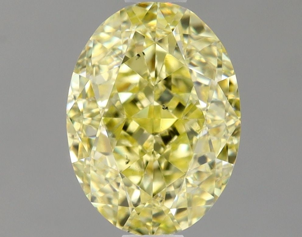 Loose Diamond - OVAL 1.32ct Fancy Yellow SI1: Loose Diamond - OVAL 1.32ct Fancy Yellow SI1 Source: Natural Shape: OVAL Carats: 1.32 Color: Fancy Yellow Certification: GIA Video: